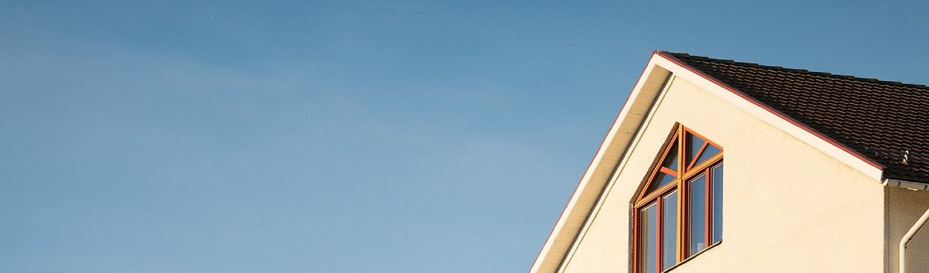 roof peak against blue sky